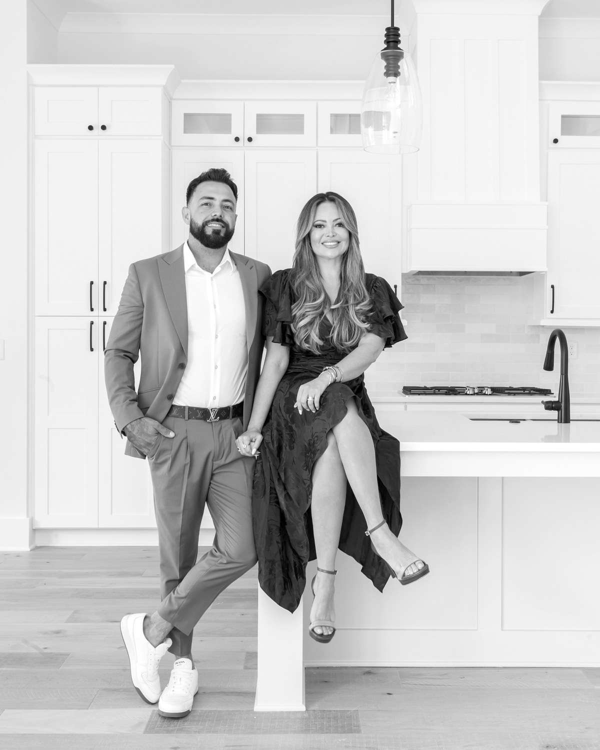 Georgia and Jeff Ribeiro in a completed Magnolia kitchen